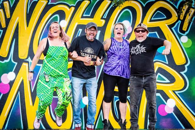 The Nah Then festival organisers, Siobhan Staniforth, Andrew Hawkins, and Colleen and Dave Drury, are seen jumping for joy at the sold-out festival.