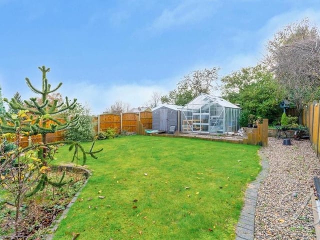 Another shot of the garden at the back of the property, showing how there is space for a greenhouse and a shed.
