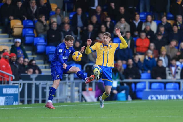 Action during the Sky Bet League 2 match against AFC Wimbledon at Cherry Red Records Stadium, 13 December 2025 Photo Chris Holloway / The Bigger Picture.media
