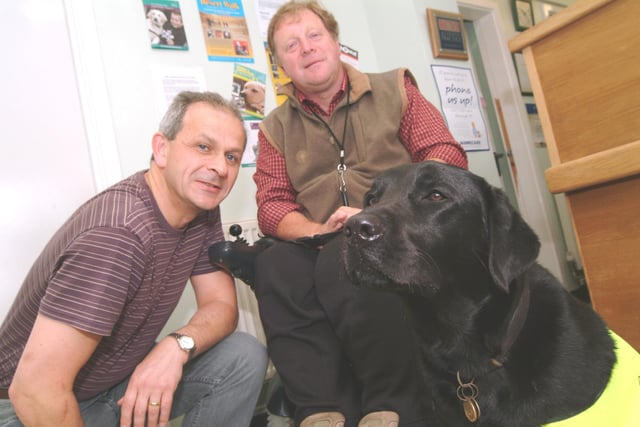 Ashfield vet Frank Flynn, took part in a desert walk to raise funds for Dogs For The Disabled. Frank is pictured with Ken Heathcote of Kirkby and his 'Dog For The Disabled' Petra who was three years old at the time.