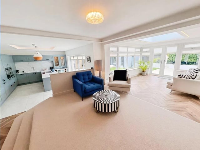 The property offers a stylish open-plan design