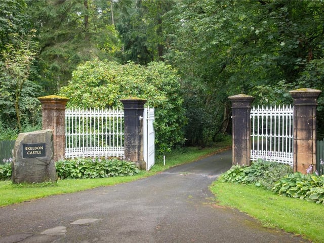 Entrance gates and driveway.