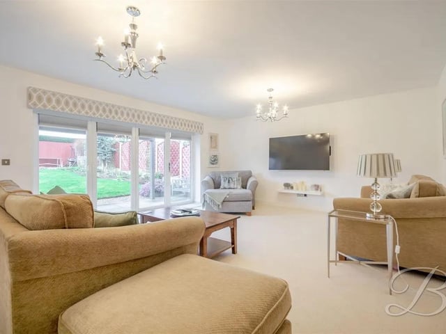 Ideal for both everyday relaxation and entertaining, the living room offers a bright, airy feel with excellent views and easy access to the outdoor space.