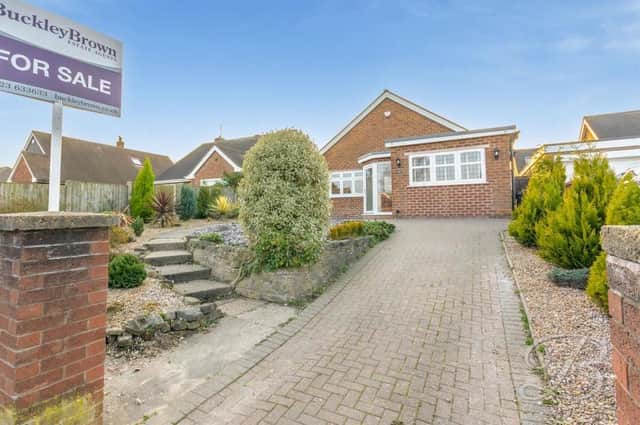 Offers in the region of £350,000 are invited for this three-bedroom, detached bungalow on Denby Drive in the Berry Hill area of Mansfield.