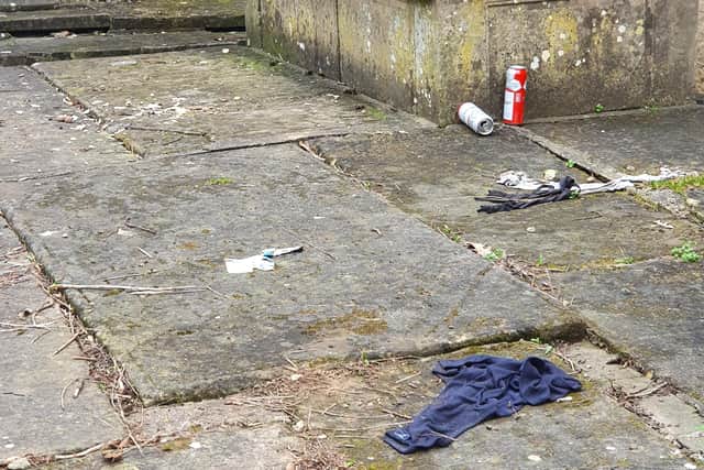 Discarded litter outside St Mary's Church in Sutton.
