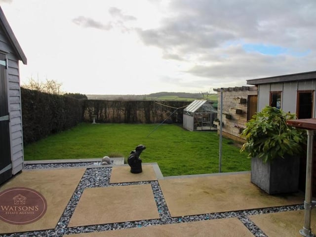 Here is one of two paved patios in the rear garden. A lovely spot when the weather is nice.