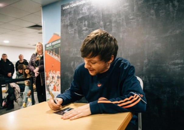Huge queues formed both outside and inside the Keepmoat Stadium as the 28-year-old from Bessacarr signed copies of his new album Walls during a return visit to South Yorkshire.