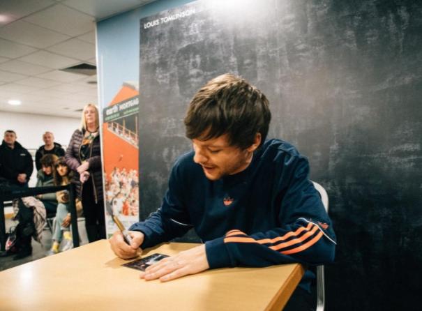 Huge queues formed both outside and inside the Keepmoat Stadium as the 28-year-old from Bessacarr signed copies of his new album Walls during a return visit to South Yorkshire.