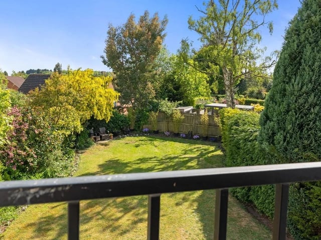 Enjoy stunning views over the garden from the Juliet balcony.
