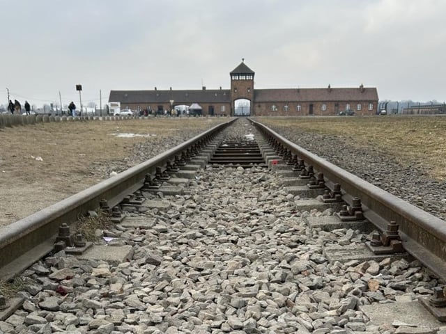 Berkenau rail line which people were shipped in on with Hell’s Gate at the end