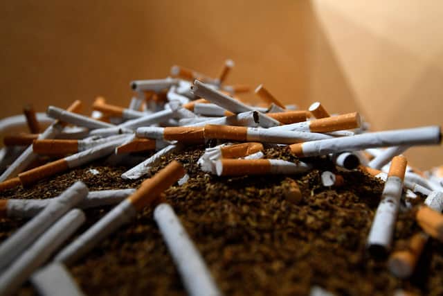 Counterfeit and illicit cigarettes and hand-rolling tobacco, with a retail value of about £20,000, were seized by trading standards officers at shops in Sutton and Mansfield.