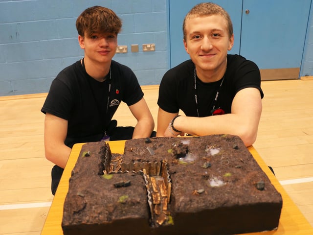 Zack Beddows and Jenson Rowley with their diorama of the trenches in the Battle of the Somme