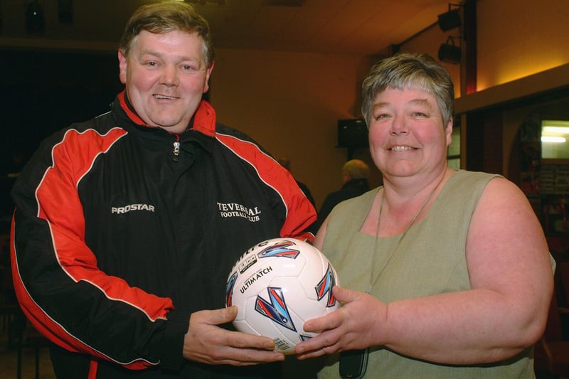 Keith Parnell, secretary of Teversal Under 12's receives the Youth Team of the Month award from Bev Harper, assistant secretary of the Chad Youth League.