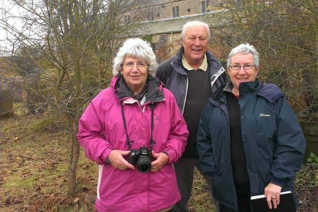 Battle of Hatfield Society volunteers helping to survey the area behind Cuckney St Mary' s Church.
From left; Penny Wilson of Worksop and Robert and Sue Longden of Mansfield.