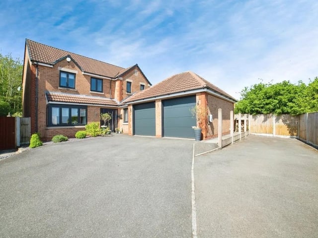To the front of the property the driveway provides parking for multiple vehicles, double garage and space for electric car charger point.