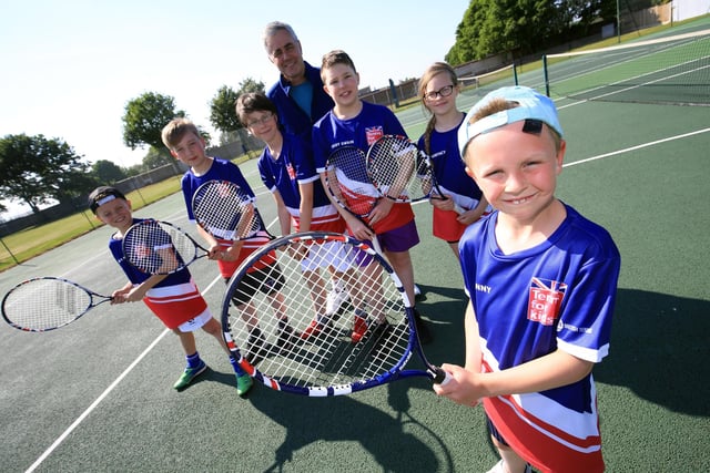 A group of youngsters enjoy the Tennis for Kids initiative at Mansfield Lawn Tennis Club in 2018.