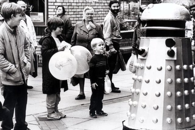 Children are surprised to find a Dalek on The Moor.