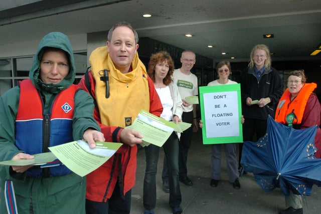 Green Party activists including on the left, Jillian Creasy and Bernard Little leaflet cinema goers outside the Odeon cinema, sheffield, before the film 'The Day After Tomorrow'.        back in 2004