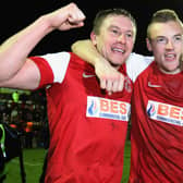 Jamie McGuire celebrates with Jamie Vardy in their successful Fleetwood Town days.
