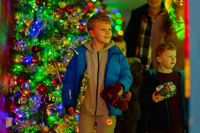 Families enjoying the Christmas Spectacular at Sundown Adventureland