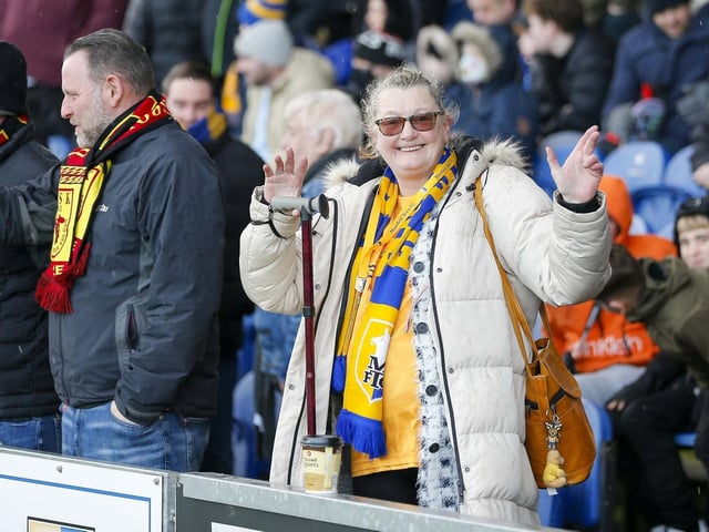 Stags fans watch the Sky Bet League 2 match against Crewe Alexandra at the One Call Stadium.