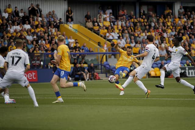 Lee Gregory gets a shot away in Saturday's thrilling home draw with Burton Albion. Photo by Chris & Jeanette Holloway/The Bigger Picture.media