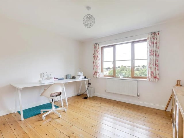 The property features ample space to work from home or use as a crafting space.
