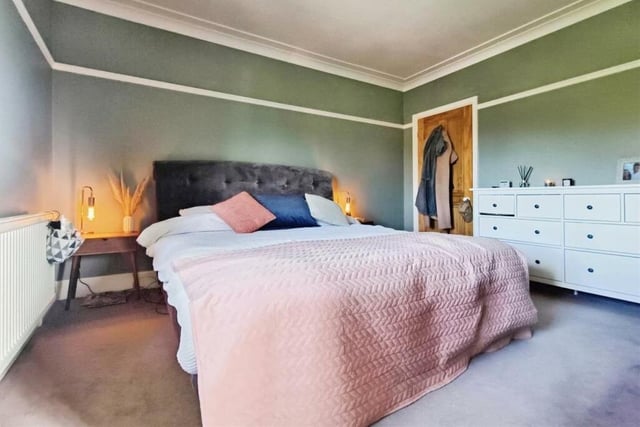 Up to the first floor now to take in this majestic master bedroom, which faces the front of the £425,000-plus house. It has a carpeted floor and access to an en suite shower room.