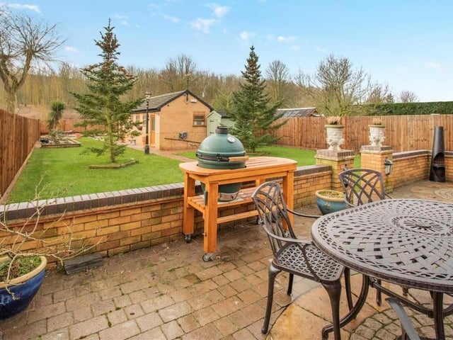 The garden at the back of Westbank features this paved patio and seating area. It is ideal for entertaining and for barbecues.