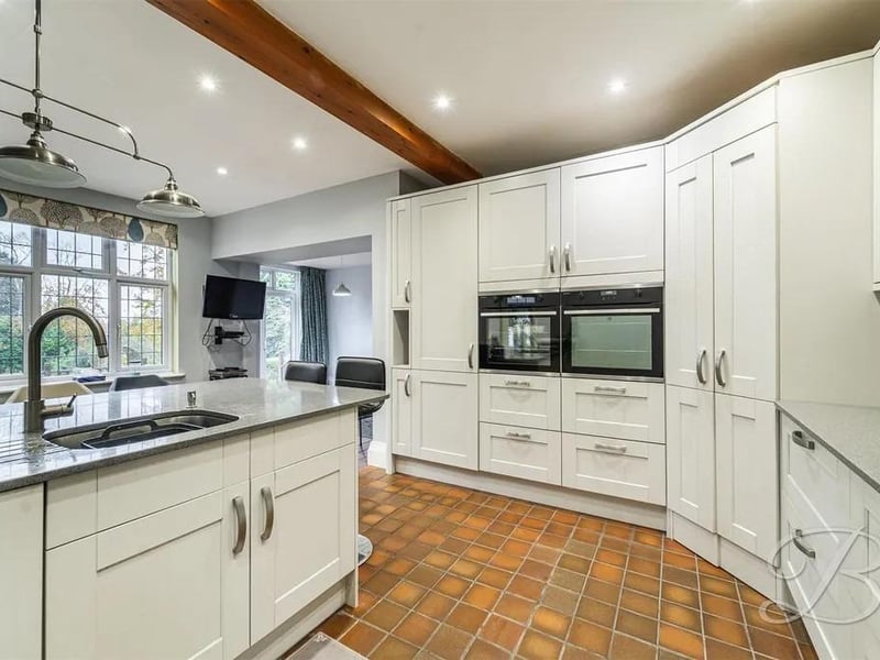 Complete with a range of matching cabinets, worktop units, inset sink and drainer along with all essential integrated appliances.