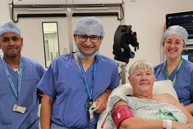 Amit Bidwai, Consultant Trauma and Orthopaedic Surgeon, pictured with Linda Jones.