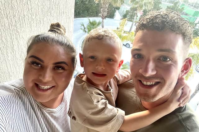 Ezra with mum Tayla and dad Olly.