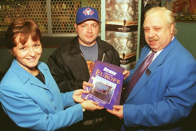 Star reader Jerome Morton (centre) received his trip to France prize from Paula Rickwood of Leger Holidays, and Richard Isaac the Senior Assistant manager at the Odeon Cinema, Arundel Gate in 1998