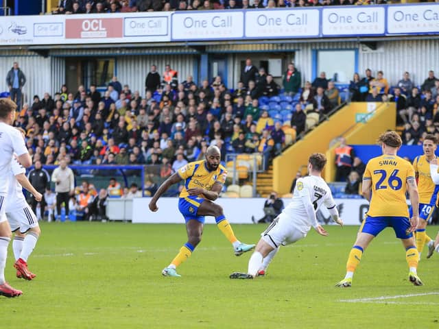 Hiram Boateng nets during the Sky Bet League 2 match against Crawley Town FC at the One Call Stadium, 06 April 2024, Photo credit Chris & Jeanette Holloway / The Bigger Picture.media