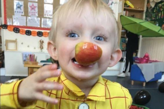 This young lad proved he was a dab hand at apple bobbing during a fun event.