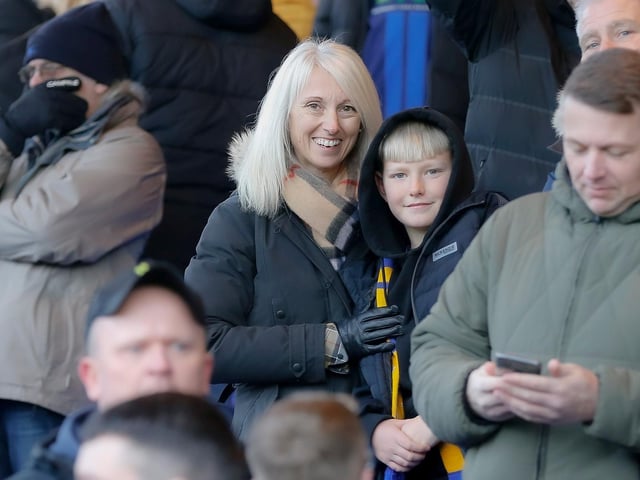 Mansfield Town fans enjoy the win at Stockport County