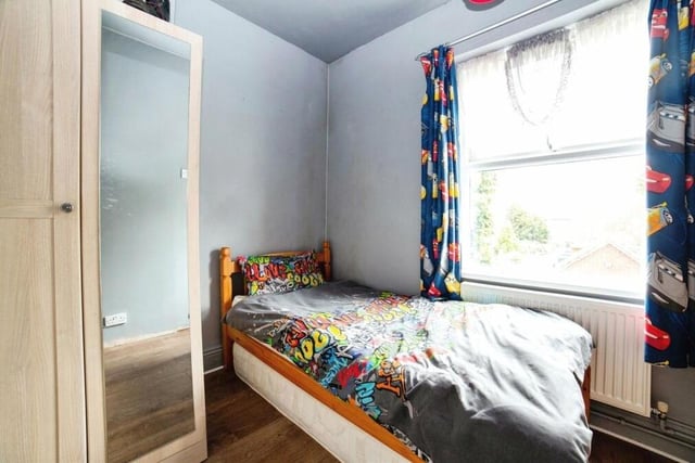 The third bedroom sits at the back of the £220,000 family home. It has laminate flooring.