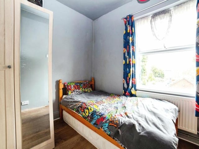 The third bedroom sits at the back of the £220,000 family home. It has laminate flooring.