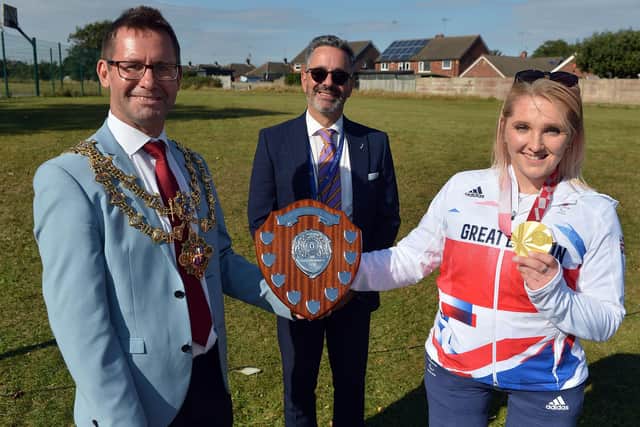 Head teacher Carlo Cuomo welcomes Mansfield's Paralympic star Charlotte Henshaw and Mayor, Andy Abrahams, to an event at All Saints Catholic Academy last September.