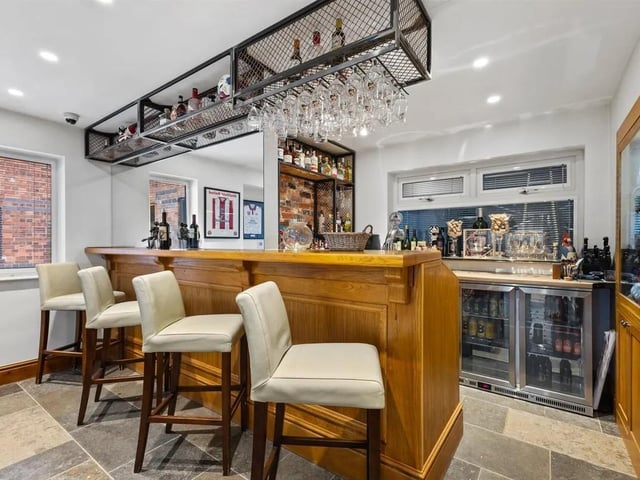 Hosting is a breeze thanks to the games room with fully equipped bar area and doors to outside patio area.