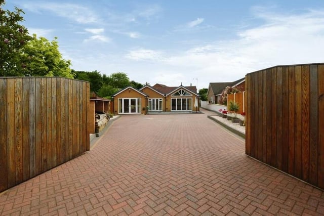 Through the electronic gates and down the extensive driveway sits this bonny bungalow at Forest Court, Mansfield, which is on the market for offers of more than £500,000 with estate agents BuckleyBrown.