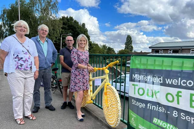Debbie said she is thankful for Mansfield District Council's donation of a bike. Debbie Williamson is pictured alongside Forest Town Community councillors.