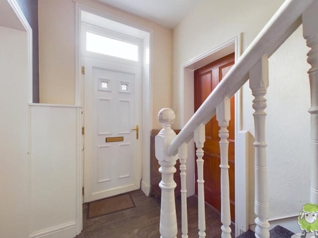 The front door that leads into a welcoming entrance hall at the £750,000 Kirkby farmhouse. Come on inside!