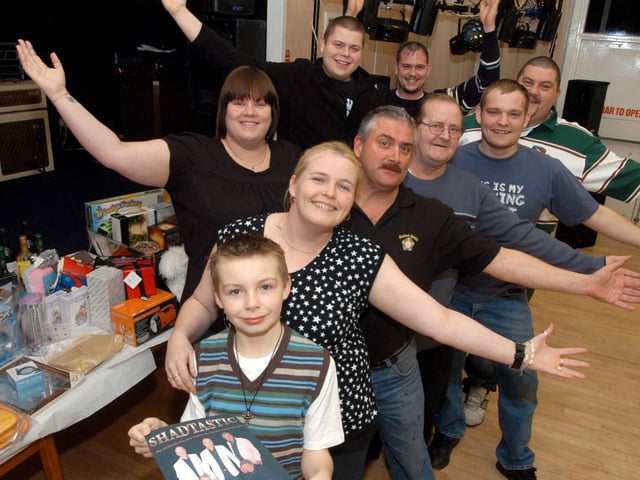 Stewardess of the Wyvern Club, Kirkby Sally Landers front and her son Bradley Landers, (front) get the party started at a charity night to help raise funds for John Eastwood Hospice. On offer was a raffle and music by Shadtastic. 2007.