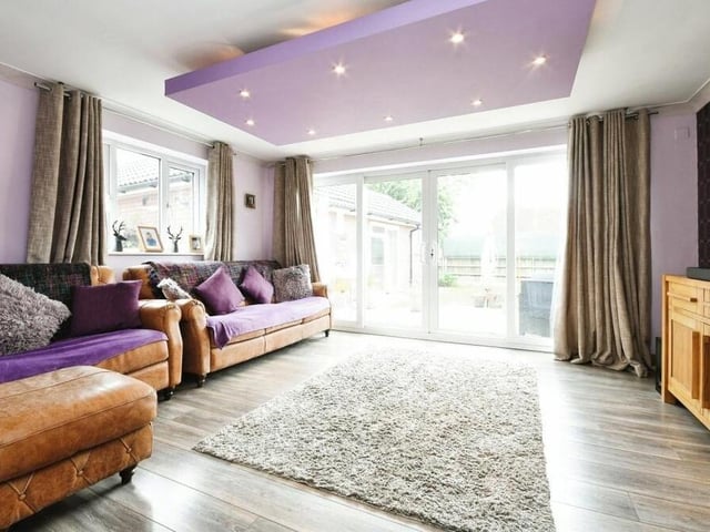 The first photo in our gallery is of the bright and spacious lounge, which has large doors leading out to the garden. It is the ideal space for the family to gather.