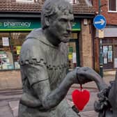 A heart on the statue of Robin Hood and Maid Marian in Edwinstowe.