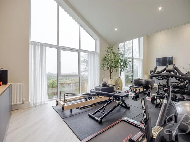 Bedroom three currently lends itself as a home gym with underfloor heating and a mirrored wall, offering a versatile space to utilise how you wish.