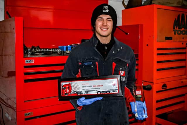 Harry with his trophy and a miniature Renault Truck at the Somercotes depot.