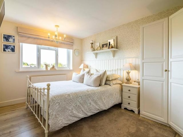 All four bedrooms can be found on the first floor, including the main one, which is the largest and faces the back of the Bayswater Road property. All four have wood-effect laminate flooring.