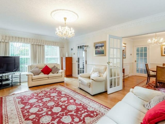 There is no better place to start our tour of Two Oaks than in the lavish lounge or living room which, as you can see, has double doors that lead through to a dining room.